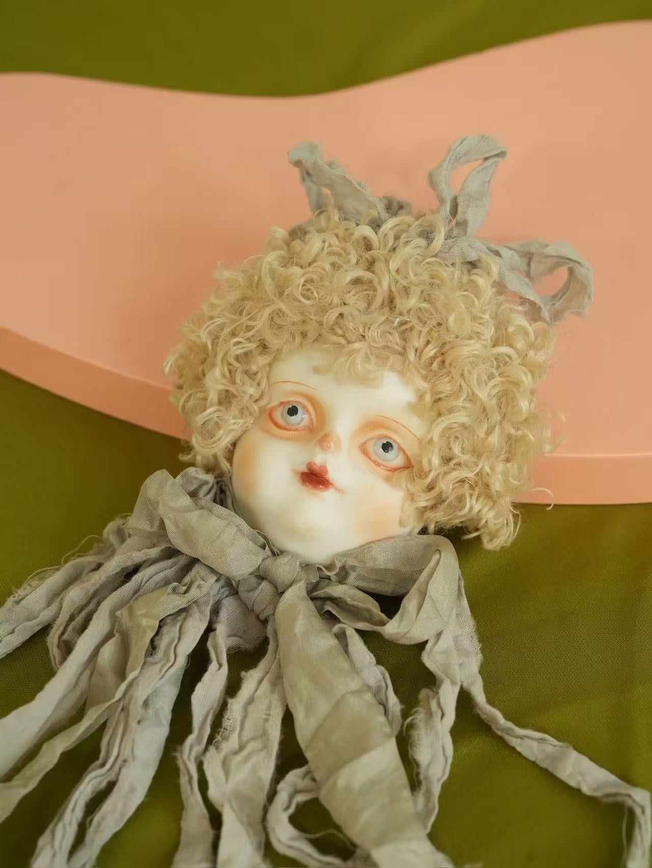 Vintage Grey Ribbon Doll Head Brooch