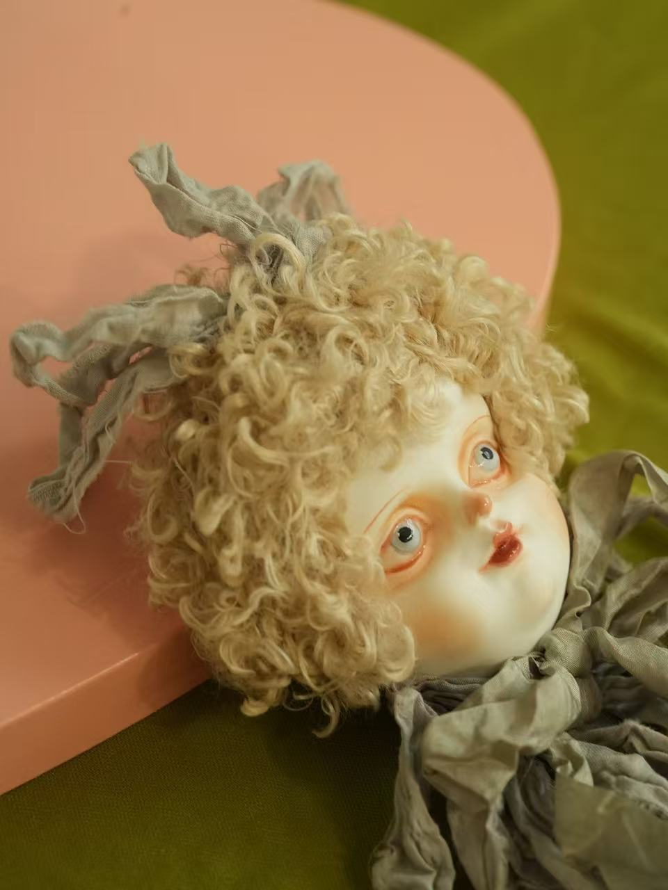 Vintage Grey Ribbon Doll Head Brooch