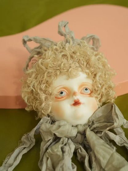 Vintage Grey Ribbon Doll Head Brooch